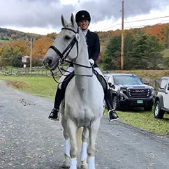 Morgan Tobin and her horse, The Big Bang “Cooper” before earning their USDF Bronze Medal.